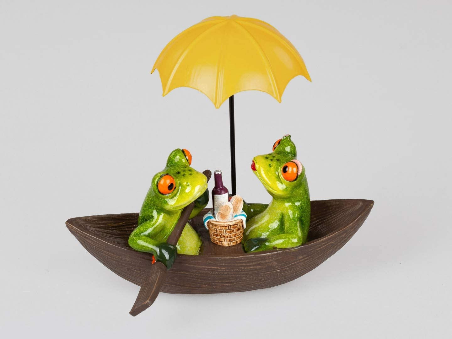 ITRR Frog pair in boat, approx. 19 x 16 cm.