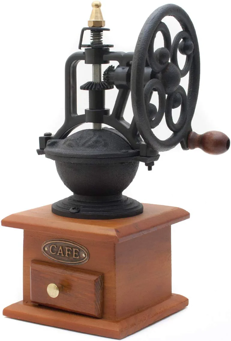 Charming retro coffee grinder with flywheel in antique design made of wood and brass espresso grinder for coffee beans