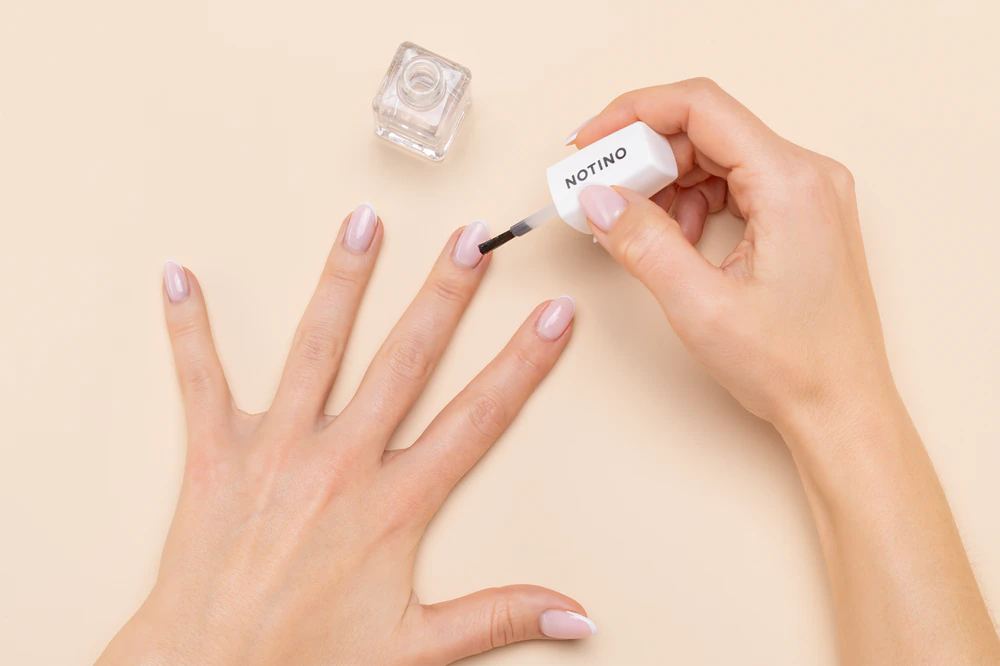 Notino Nail Care Strengthening Vitamin Base Coat nourishing nail polish with vitamins A, C, E