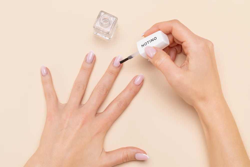Notino Nail Care Strengthening Vitamin Base Coat nourishing nail polish with vitamins A, C, E