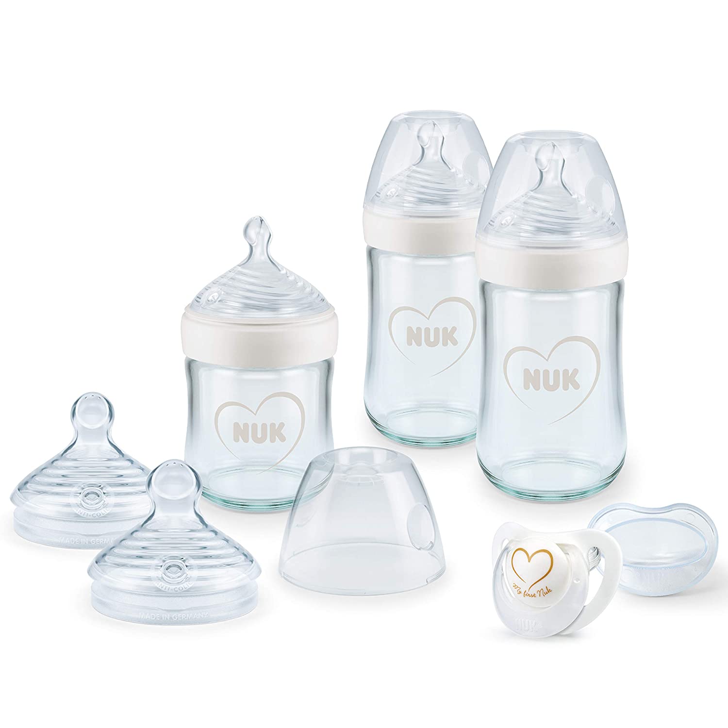 NUK Nature Sense Babyflaschen aus Glas, Starter Set | 0–6 Monate | 3 x Anti-Colic-Babyflaschen, Sauger & Genius Schnuller | BPA-frei | Herz (neutral) | 7 Stück
